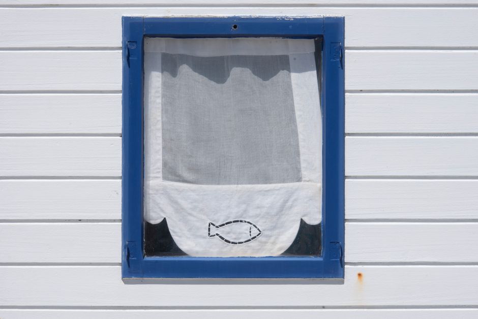 Kinderkamer met anker motif en maritieme gordijnen. Kinderkamer met anker motif en maritieme gordijnen.